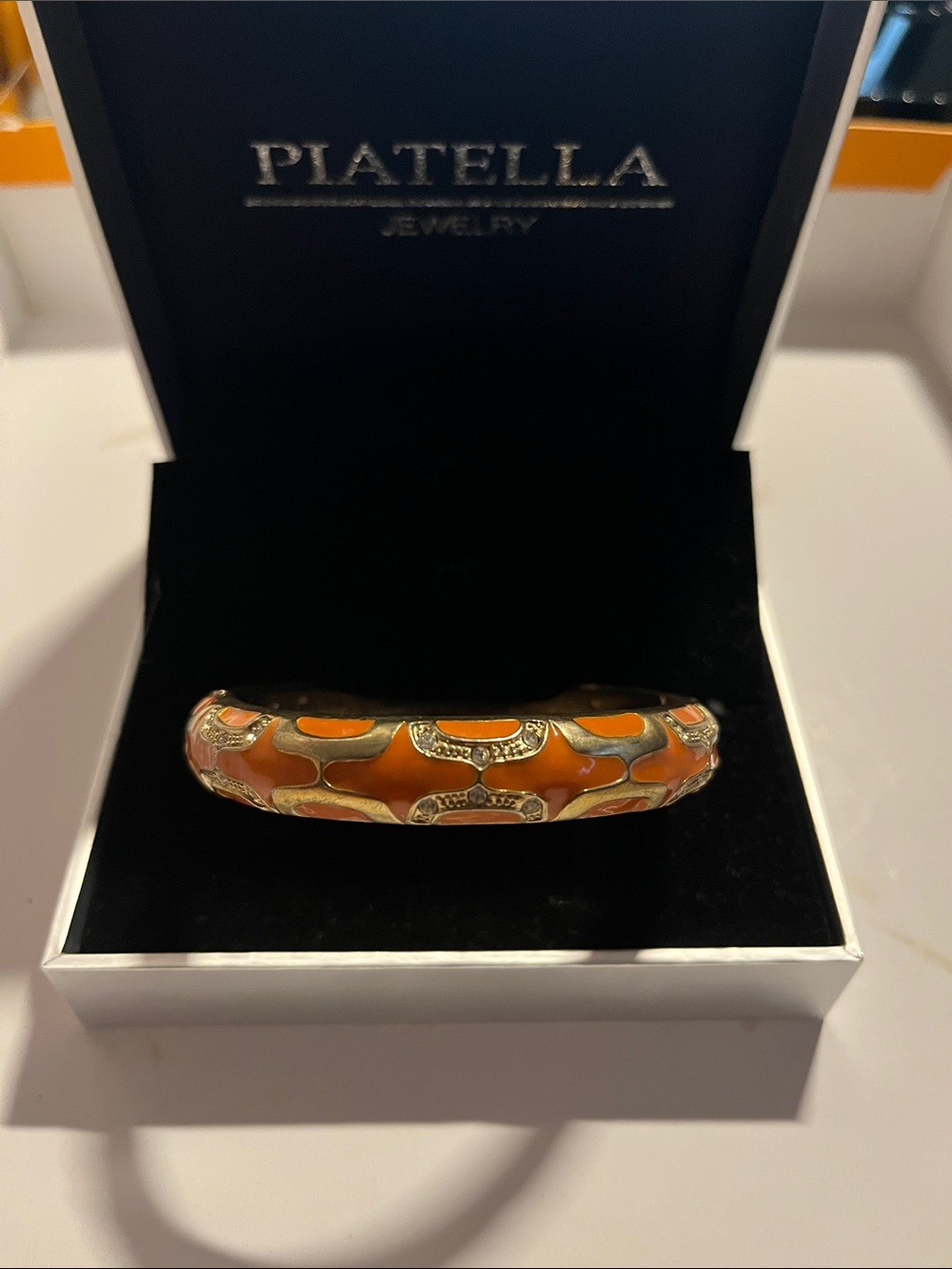 Piatella Orange Enamel Hinged Bangle Bracelet with Gold Trim